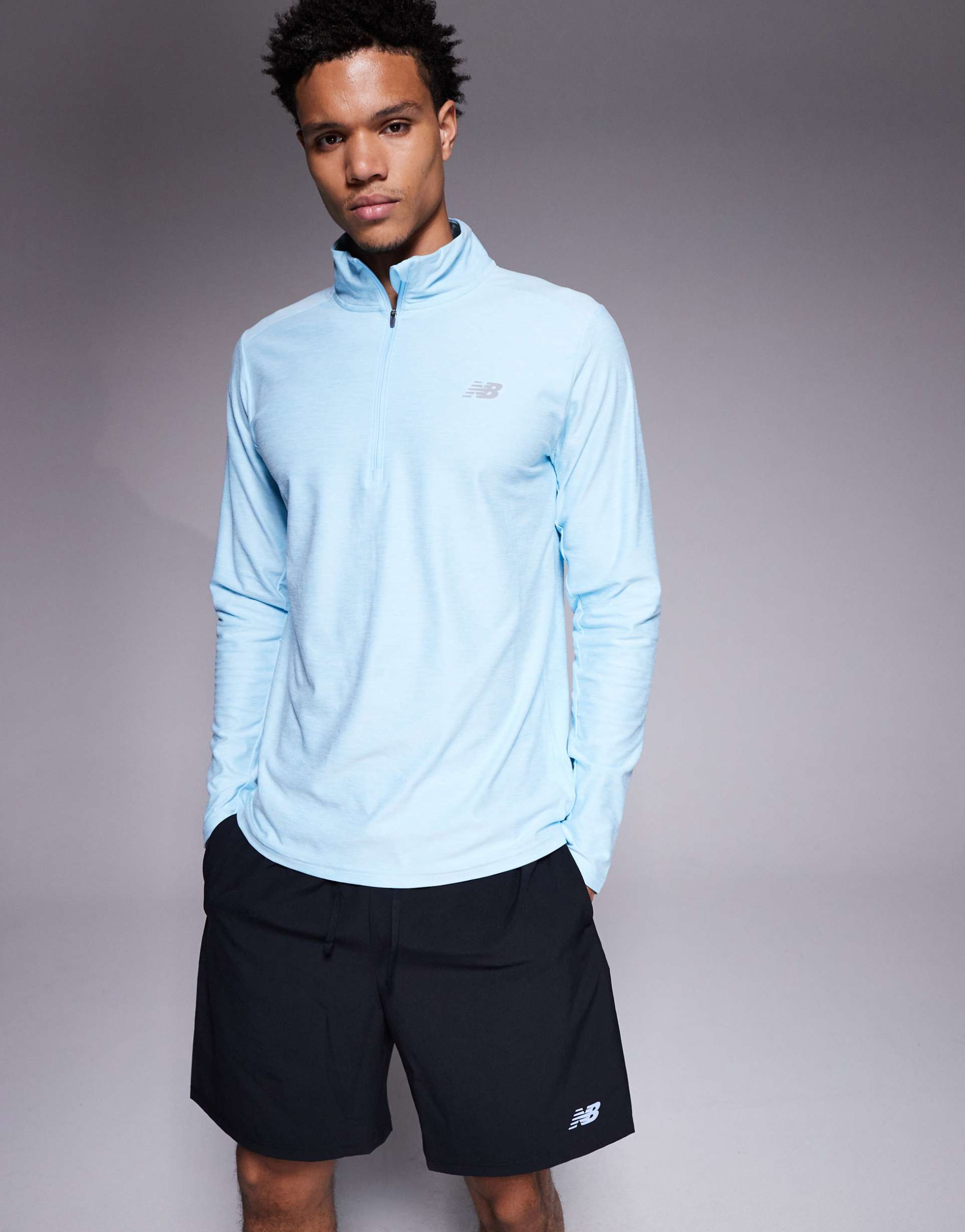 New Balance - Top con zip corta azzurro