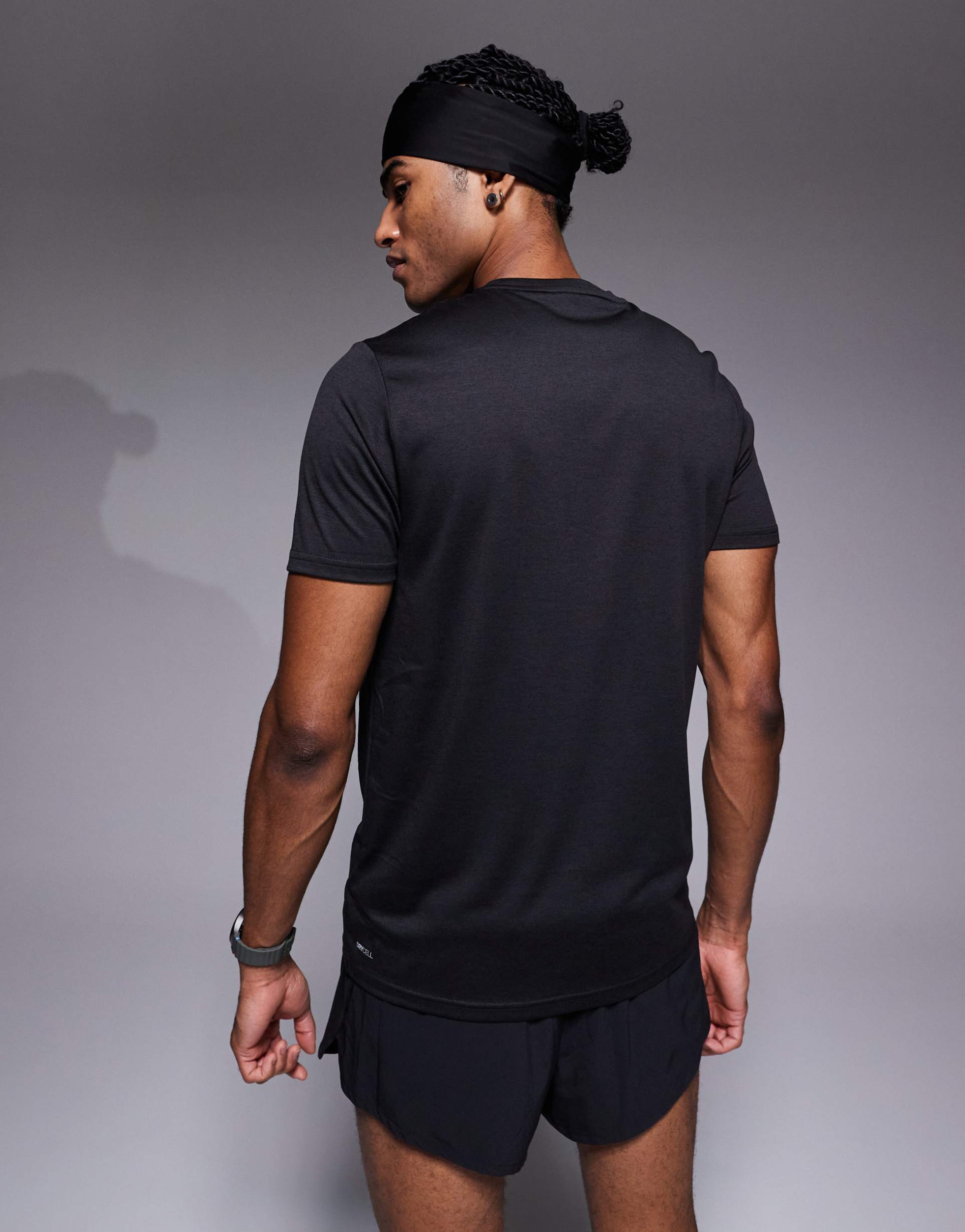 PUMA - Tad Essentials - T-shirt da allenamento nero mélange con logo