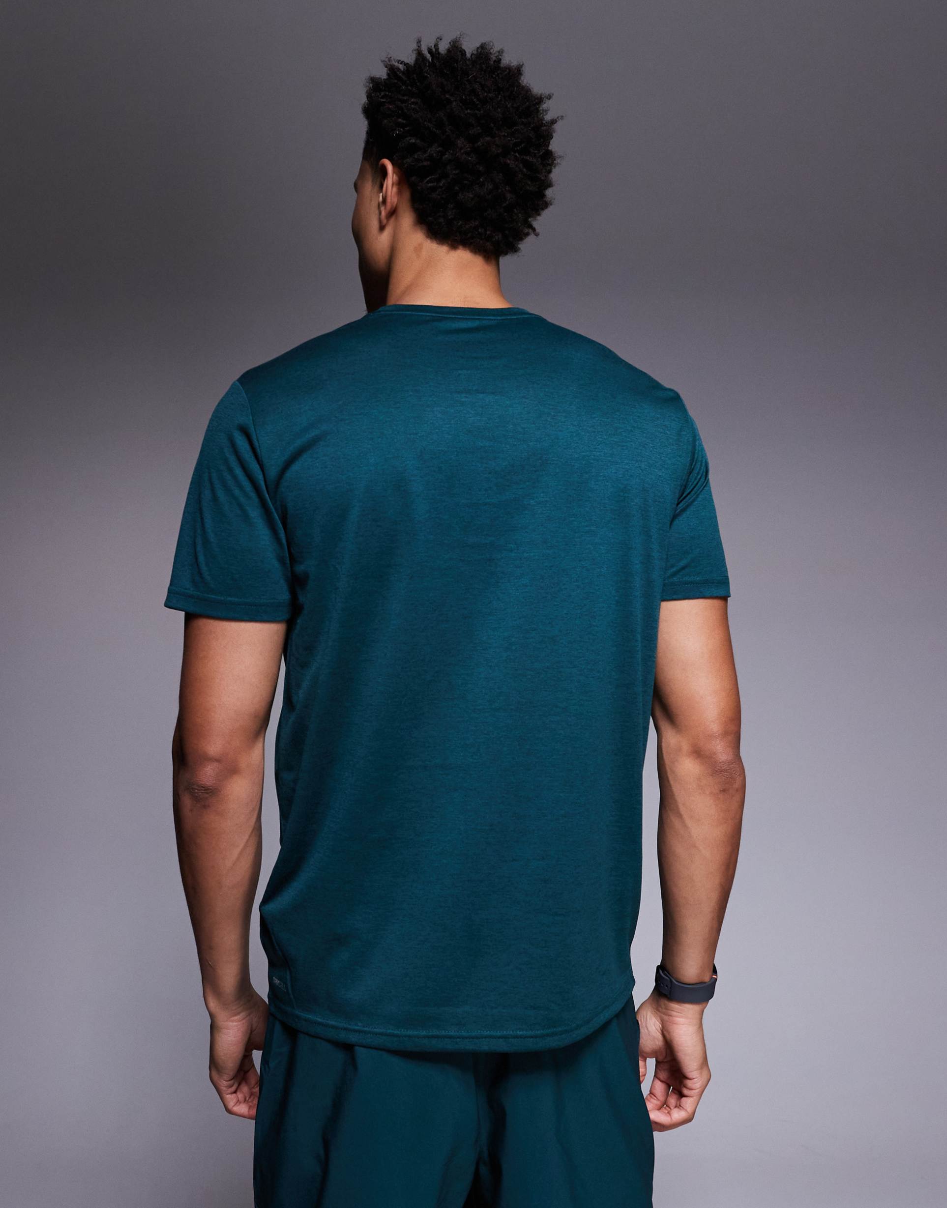 PUMA - Tad Essentials - T-shirt da allenamento verde mélange con logo