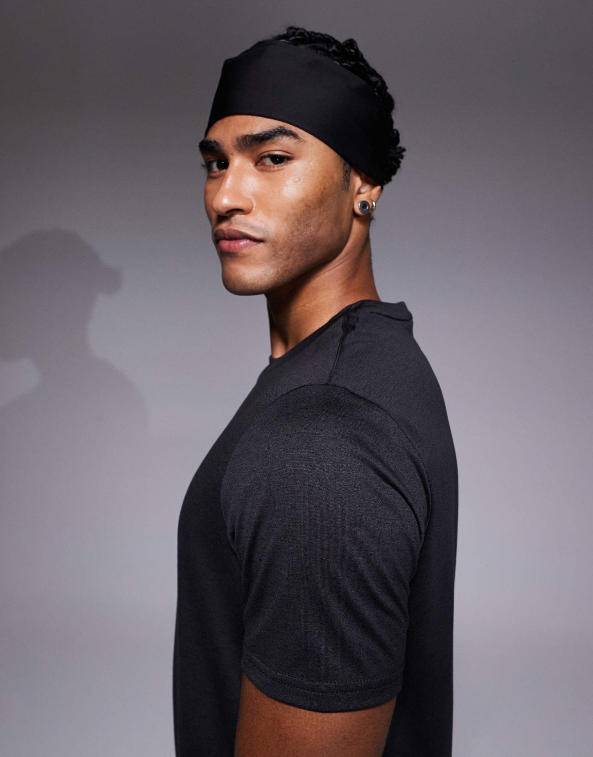 PUMA - Tad Essentials - T-shirt da allenamento nero mélange con logo